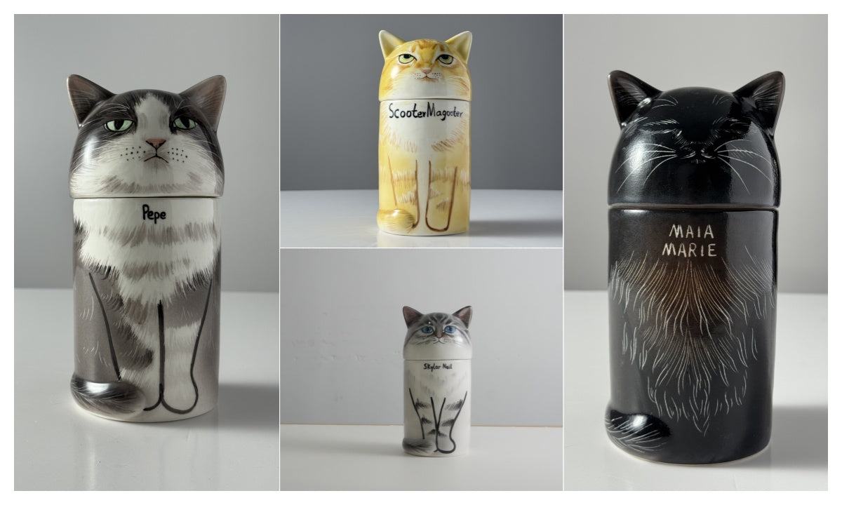 Collection of cat-shaped containers with different designs on a white background