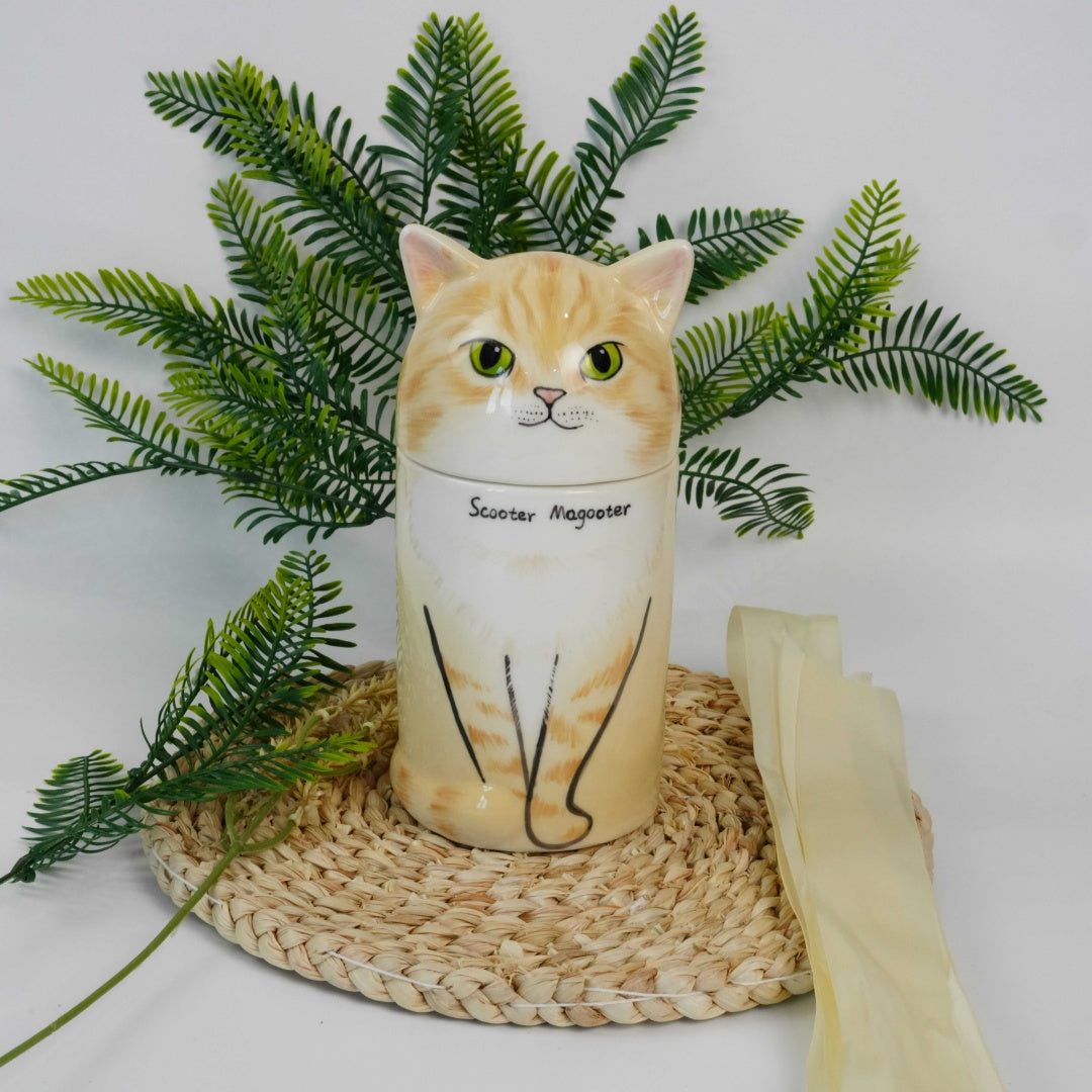 Cat-shaped container with green leaves in the background